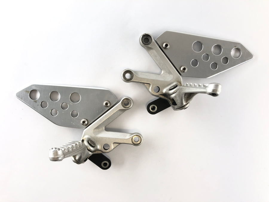 Aprilia RSV 1000 RR Factory [2009] - Driver footrests with holder right and left set
