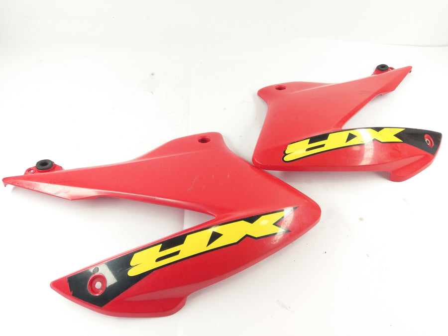 Honda XR 125 L JD19 [2005] - Side panel right and left with crack