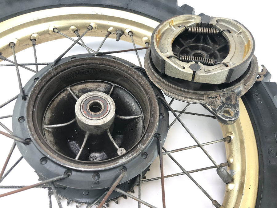 Yamaha XT 500 1U6 [1981] - Rear wheel rim gold spoke wheel 1.85 x 18" with drum brake