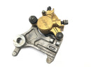 Honda FMX 650 RD12 [2006] - Rear brake caliper Nissin with holder plate-1
