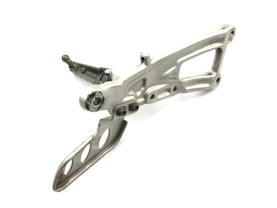 Aprilia RS 125 TW [2017] - Footrest system driver footrest with holder at the front right