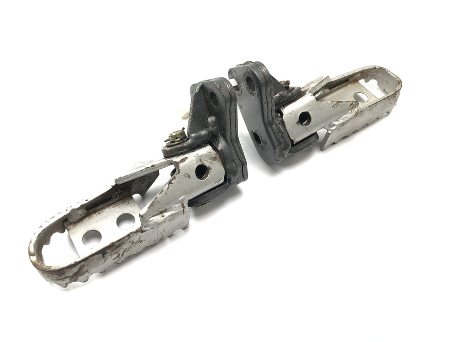 Husqvarna TE 610 E Dual H7 [1999] - Driver footrests with spring mechanism set pair