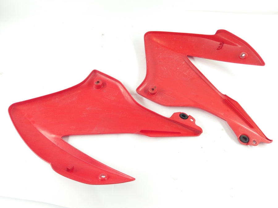 Honda XR 125 L JD19 [2005] - Side panel right and left with crack